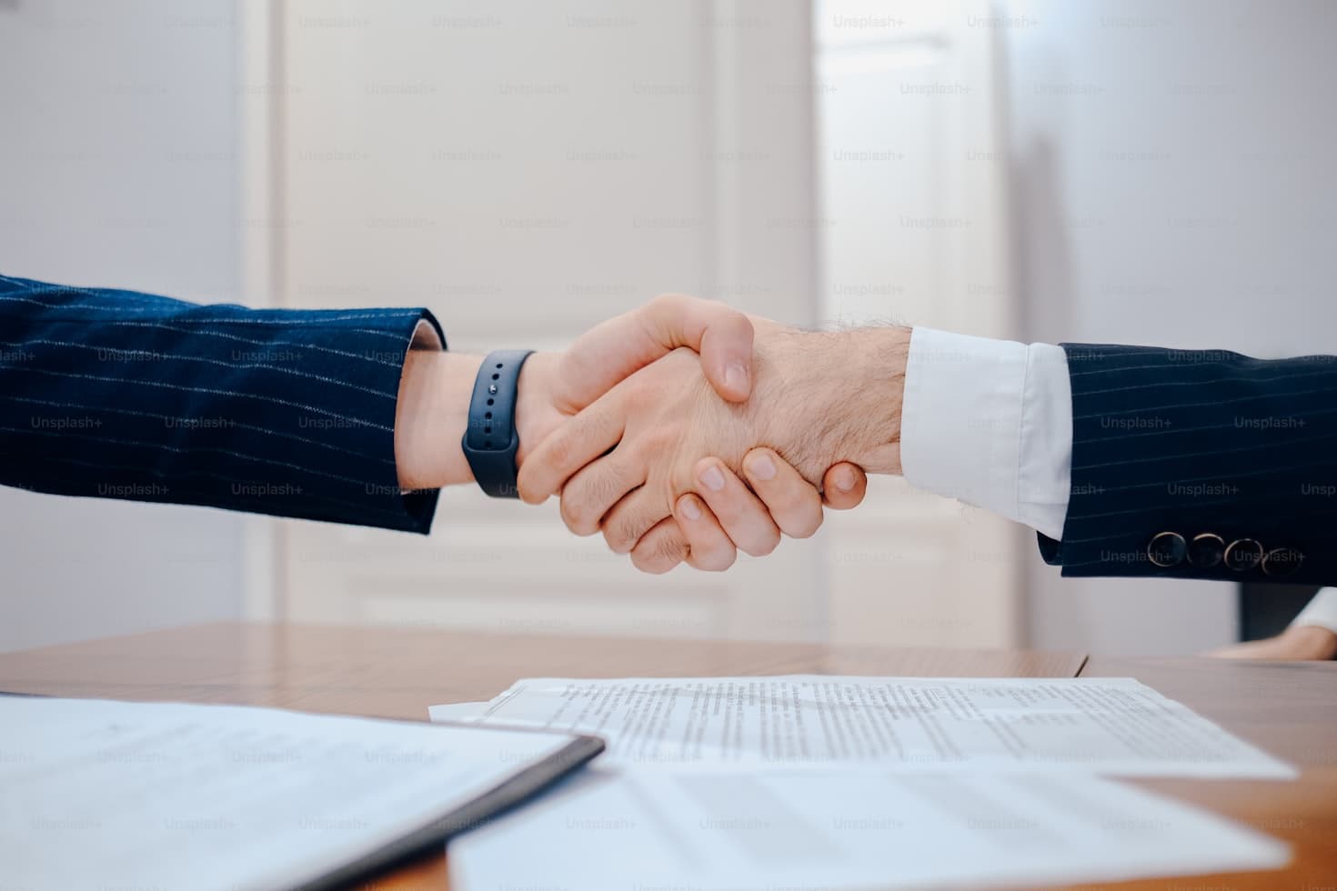Handshake representing our commitment to getting you the best deal